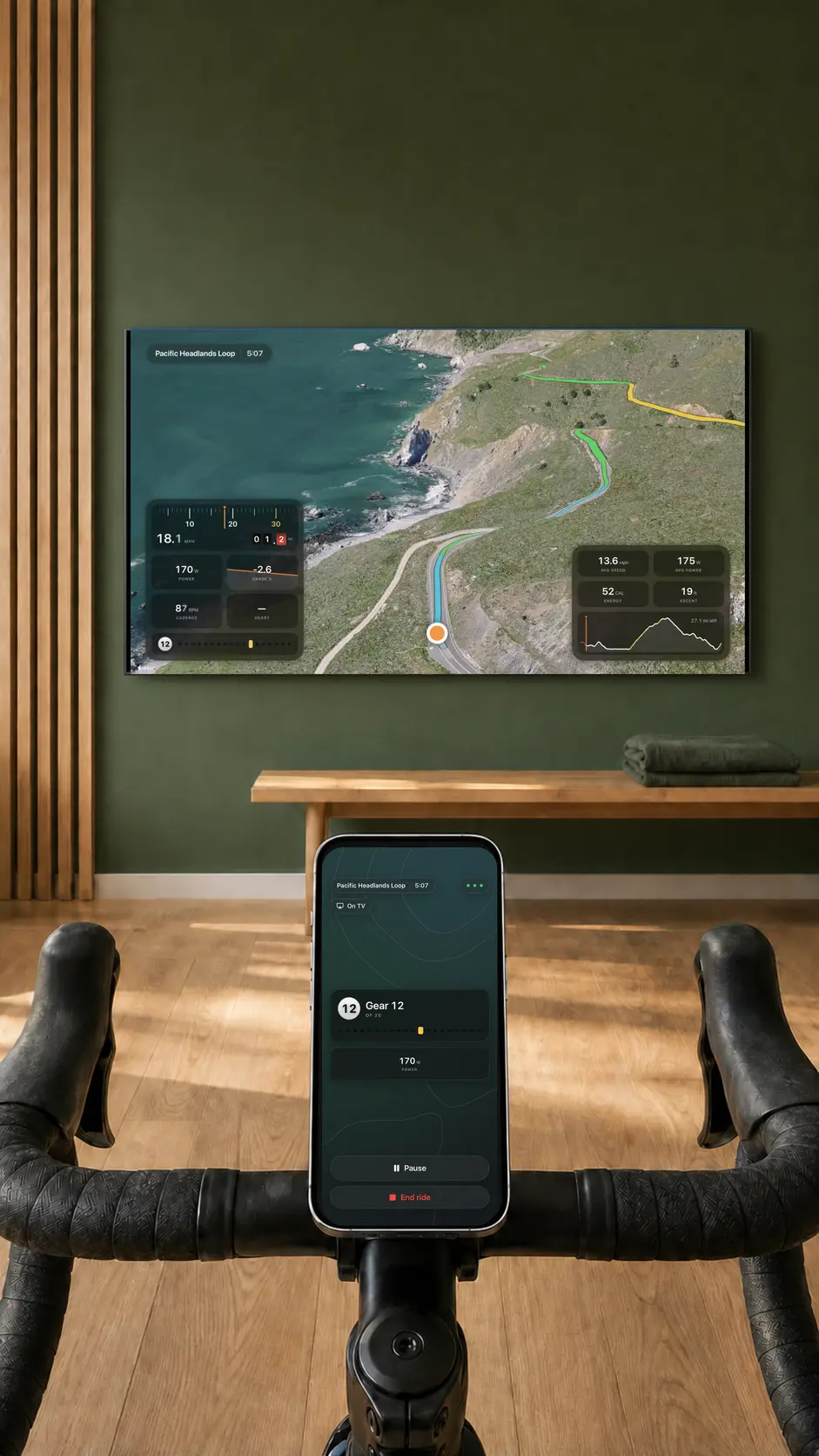 A Contour ride on a living room TV, with the iPhone on the handlebars showing the current gear